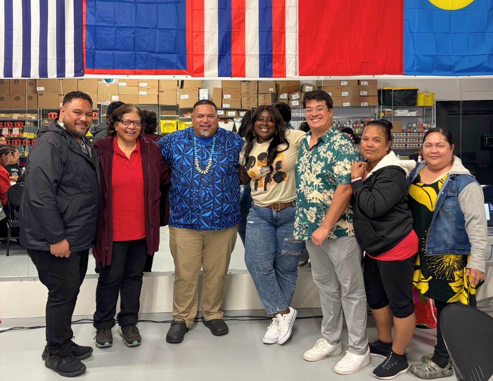 CPC's Executive Director Eci Ameh, Commissioner Joseph Seia, and Mario Teulilo with community members at the Oceania Northwest Opening Blessing. 