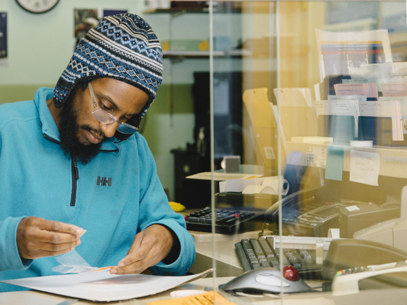 Staff member working at the University Customer Service Center