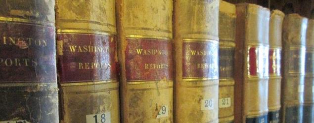 Photograph of old law books. 