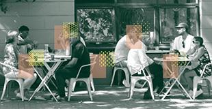 Image of people eating outside restaurants