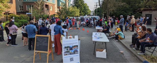 People gather in a street closed to traffic in Seattle