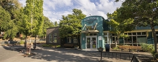 The front of the Delridge Community Center with its aqua colored front doors