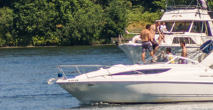 People on boats at the  Andrews Bay Anchorage