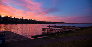 Colorful pink and blue sunset at the Rowing and Sailing Center