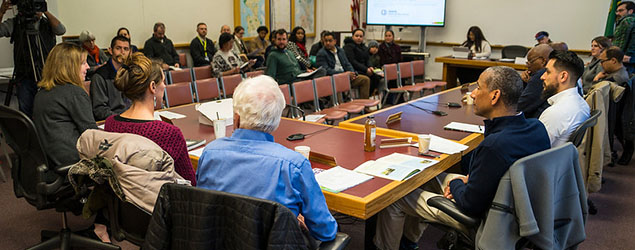People attending a task force meeting