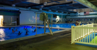 Medgar Evers Pool with a Dive-In Movie playing