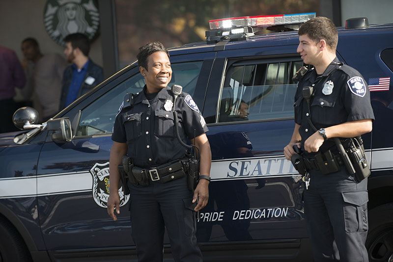Officers near squad car
