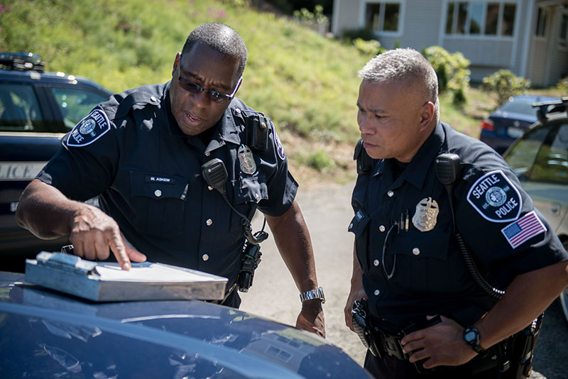 Two police officers talking