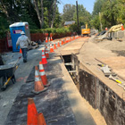 A big trench showing a water main installation