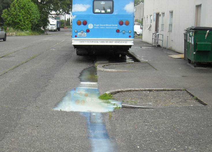 A contractor disposed of floor wax wastewater to the street, causing a discharge to the storm drain system.
