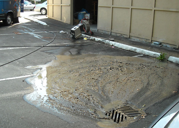 A side sewer back up resulted in a wastewater discharge to the drainage system, which discharges to nearby Thornton Creek.