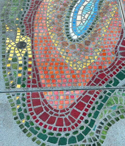 Detail of mosaic artwork in concrete.