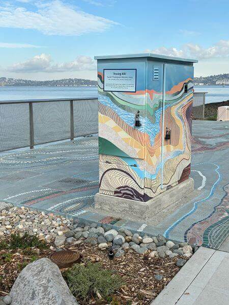 Utility box from side looking east with downtown Seattle in background.