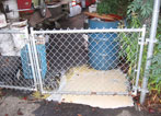 Improper storage of grease and other chemicals resulted in a release to the street and drains.