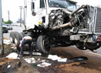 A semi truck accident resulted in a release of automotive fluids.
