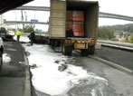 A semi truck accident and fire resulted in a spill to the Duwamish Waterway. SPU deployed a water and land crew to mitigate the spill.