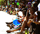 Community members wait for the start of the Rainier Valley Heritage Parade, 2011. Credit: SDOT