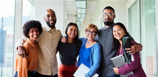 Diverse employees working together
