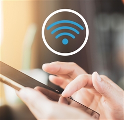Hands using phone on free wi-fi