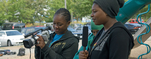 Young adults using video and sound equipment.