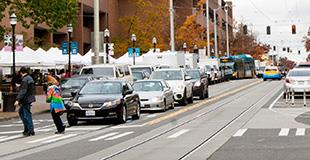 A street with cards is seen in front of Seattle Central College