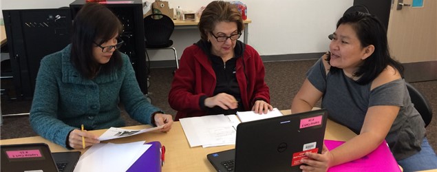 City staff assisting customers at a service event