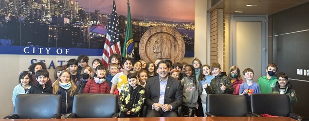 Mayor Harrell with young people in City Hall