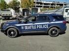This photo shows a Seattle Police Department patrol vehicle from the side.