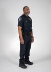 This photo shows a Seattle Police Department officer turned to the left, wearing his police uniform.