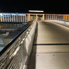 The new pedestrian bridge features programmable lighting and an expanded width. 