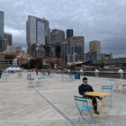 People sitting at tables on Pier 62