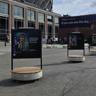 Temporary art installations on South Plaza on Railroad Way with the stadium in the background Previous