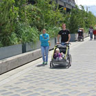 The old sidewalk was replaced with light-penetrating surfaces that allow natural sunlight through to the water below
